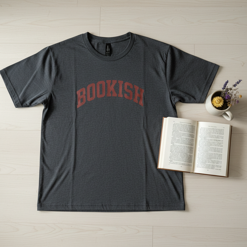 Bookish t-shirt flat lay with books and dried flowers